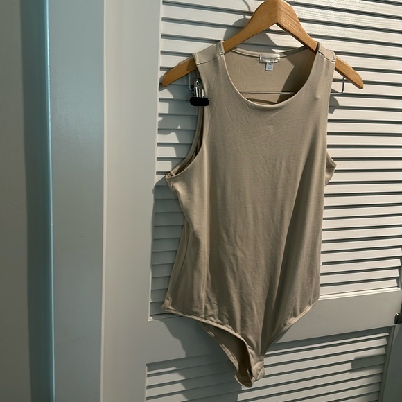 NWOT  Orange Kiss Cream Sleeveless Body Suit with Snap Closure. Size 1X - Picture 1 of 5